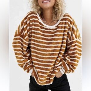 NWT. Retail $98. FREE PEOPLE Sz L. Striped Fuzzy Sweater mustard yellow & white.